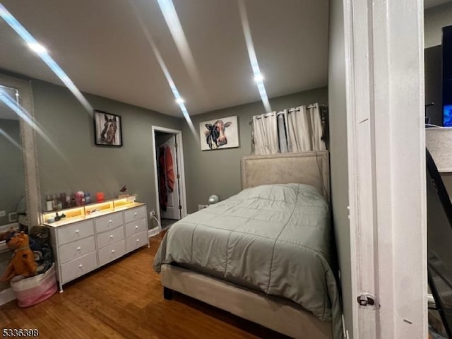 bedroom featuring hardwood / wood-style flooring