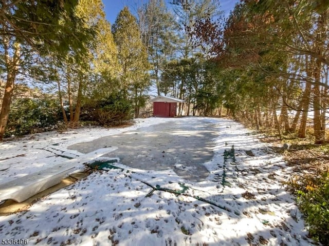 view of yard layered in snow