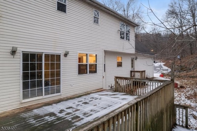 view of snow covered deck