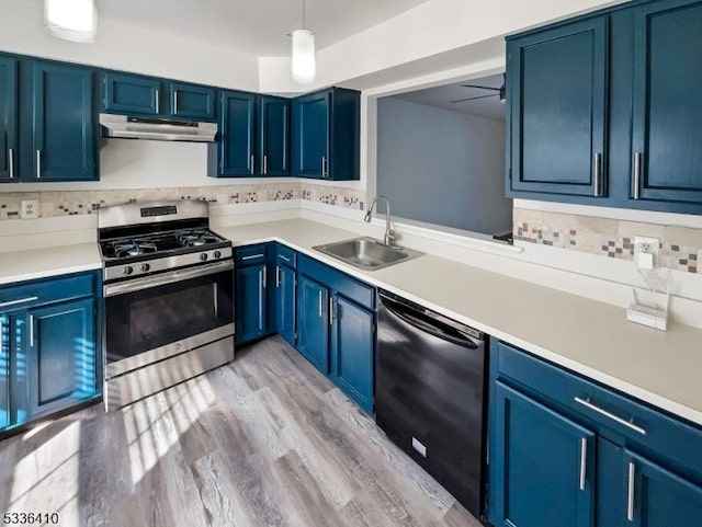 kitchen featuring blue cabinets, dishwasher, sink, and stainless steel gas stove