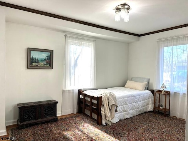 bedroom featuring ornamental molding