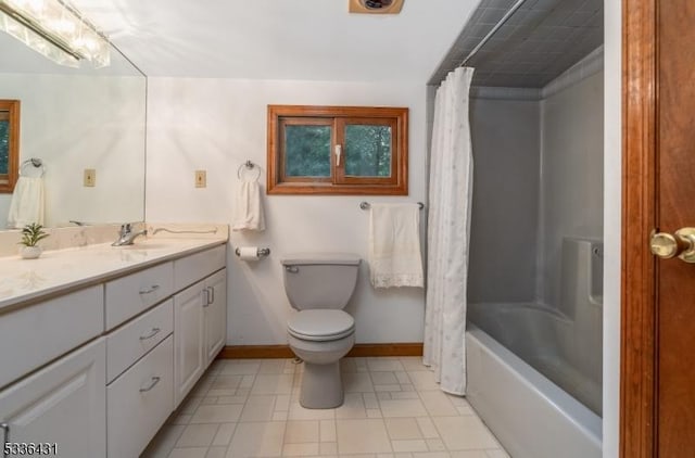 full bathroom with vanity, shower / bath combo, and toilet