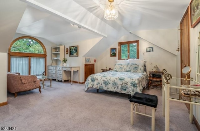 bedroom featuring multiple windows, carpet floors, lofted ceiling, and a chandelier