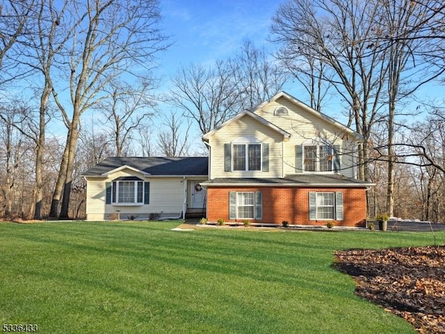 view of front of house with a front lawn