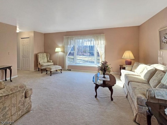 living room featuring light colored carpet