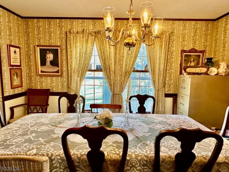 dining room featuring a chandelier