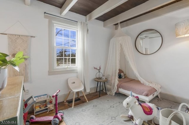 bedroom with beamed ceiling