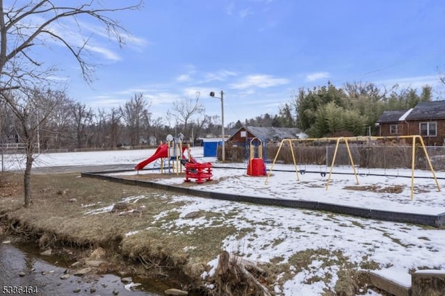 view of snow covered playground