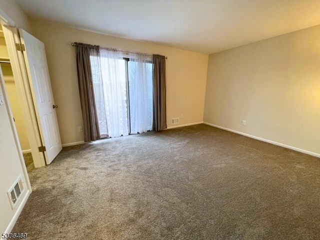 view of carpeted spare room