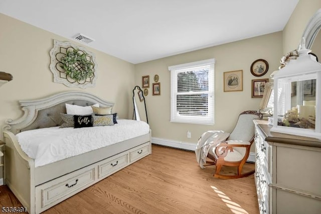 bedroom featuring light hardwood / wood-style floors