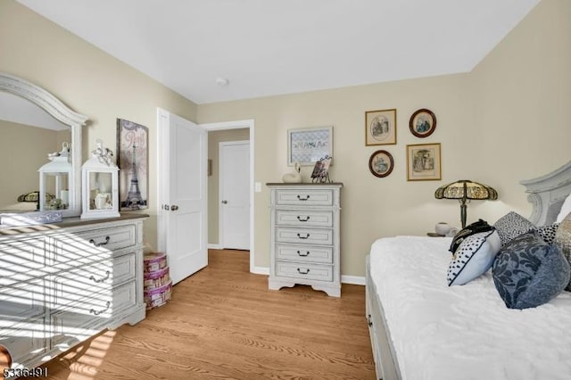 bedroom featuring light wood-type flooring