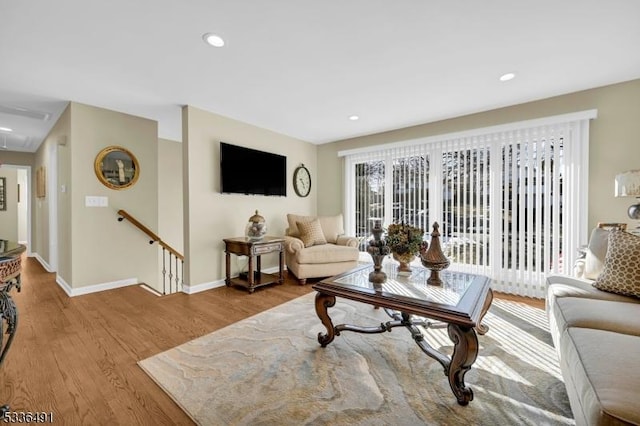 living room with light hardwood / wood-style floors