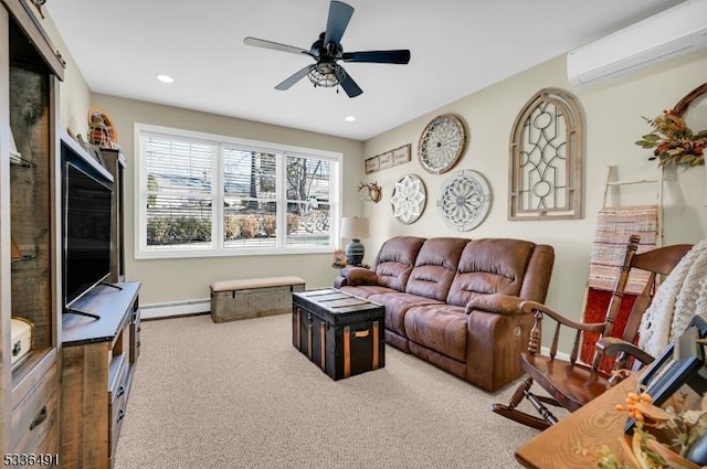 living room with a baseboard heating unit, ceiling fan, a wall mounted AC, and carpet flooring