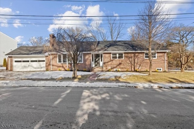 single story home with a garage