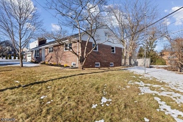 view of home's exterior featuring a yard