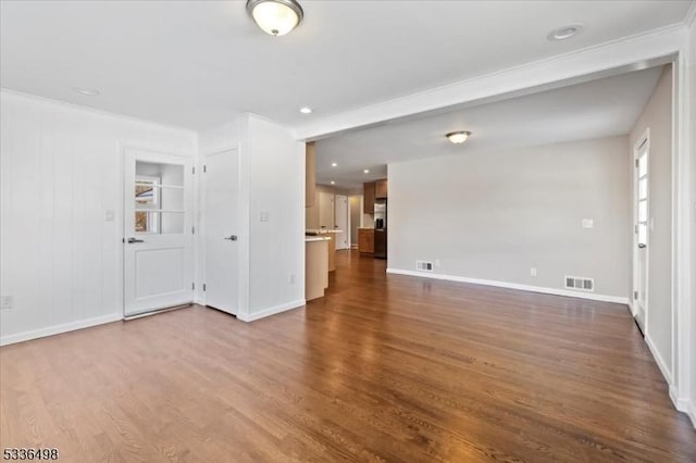 empty room with wood-type flooring