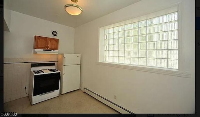 kitchen featuring white appliances and a baseboard radiator