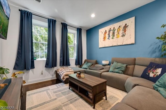 living room with hardwood / wood-style floors