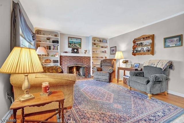 living room with hardwood / wood-style floors and a fireplace