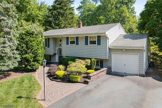 bi-level home with a garage