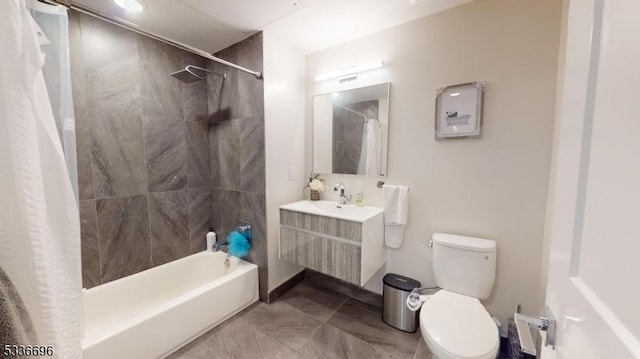 full bathroom featuring vanity, shower / bath combination with curtain, and toilet