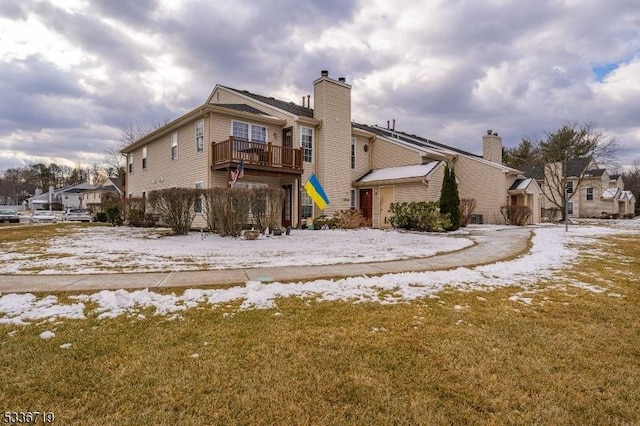 exterior space featuring a front yard and a residential view