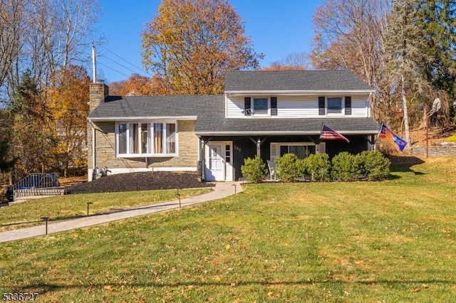 split level home with a front yard