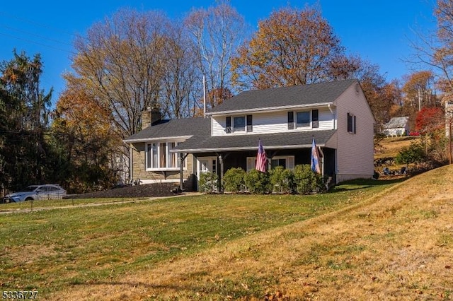 view of front of home featuring a front yard