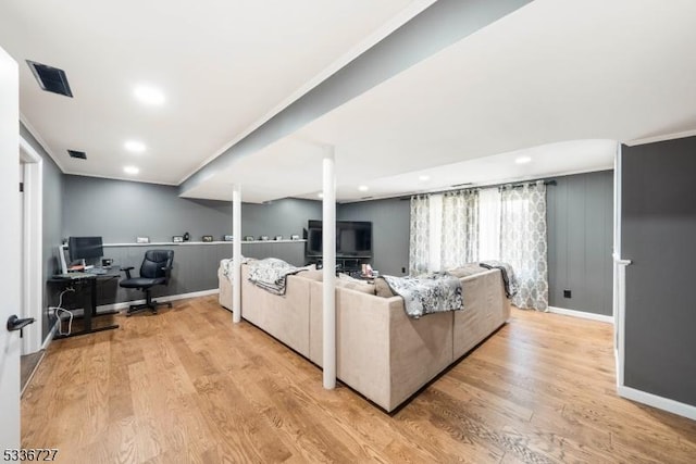 living room with light hardwood / wood-style flooring