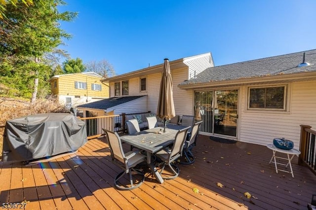 wooden deck with area for grilling