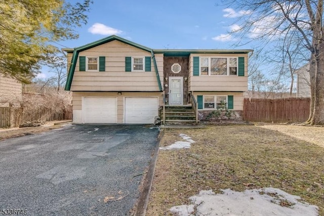 bi-level home with a garage