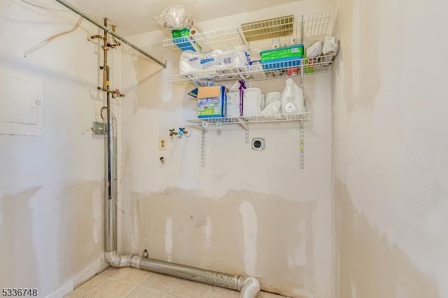 laundry room with washer hookup, hookup for an electric dryer, and light tile patterned flooring