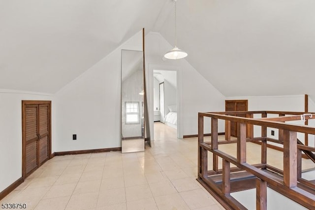 bonus room with vaulted ceiling