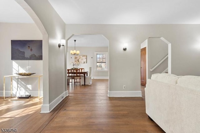 corridor with dark hardwood / wood-style floors