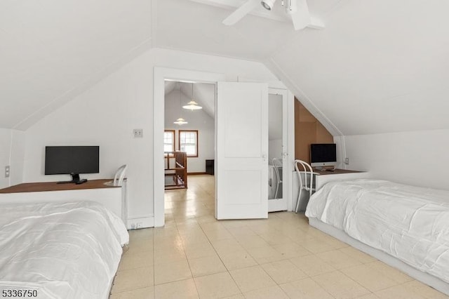 bedroom featuring ceiling fan and lofted ceiling