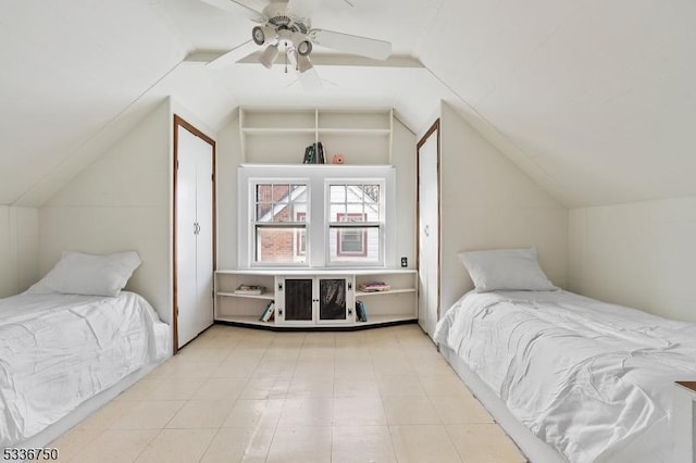 bedroom featuring vaulted ceiling and ceiling fan