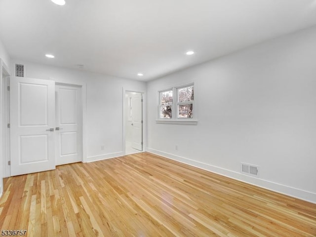 empty room featuring light hardwood / wood-style flooring