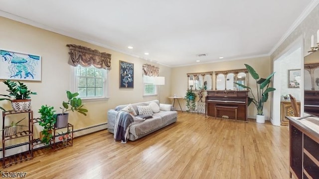 sitting room with crown molding, baseboard heating, and light hardwood / wood-style flooring