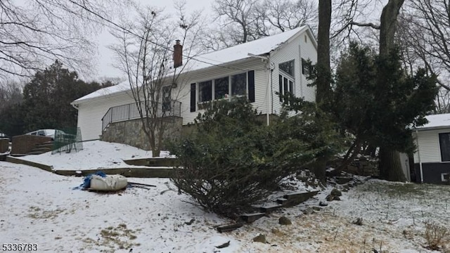 view of snow covered property