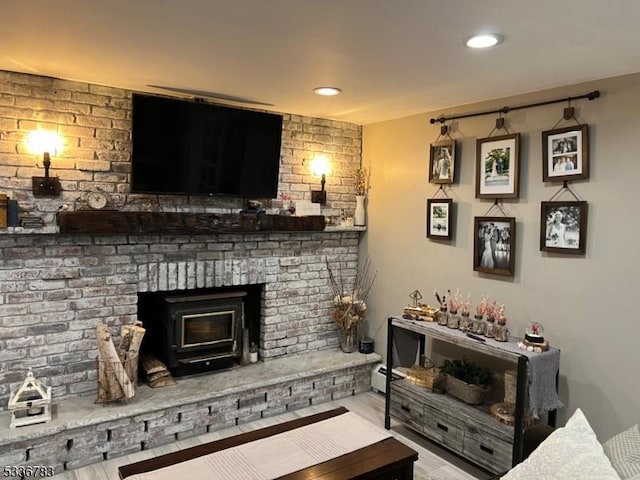 living room with a wood stove