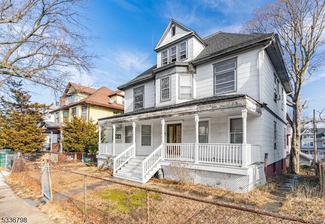 victorian-style house with covered porch