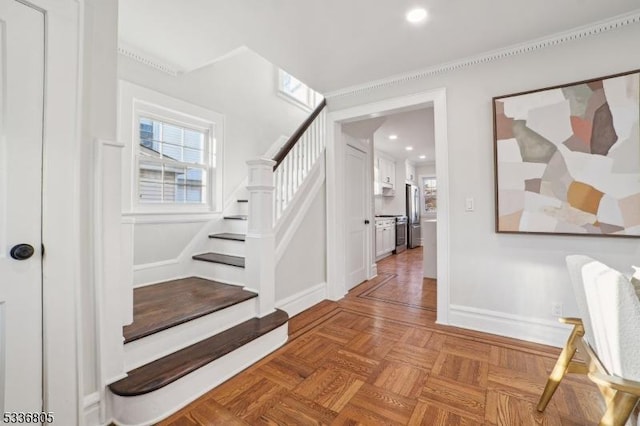 staircase with parquet floors