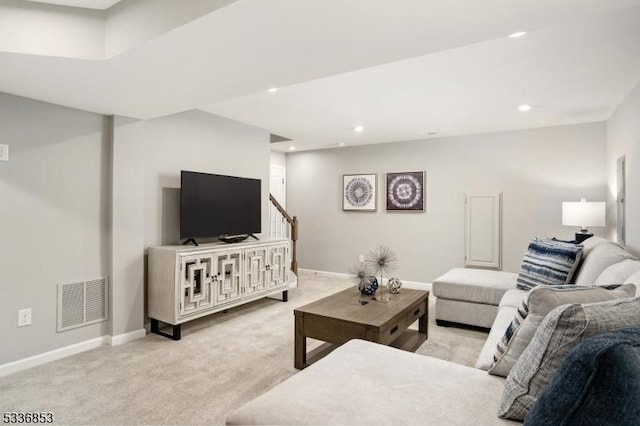 living room featuring light colored carpet