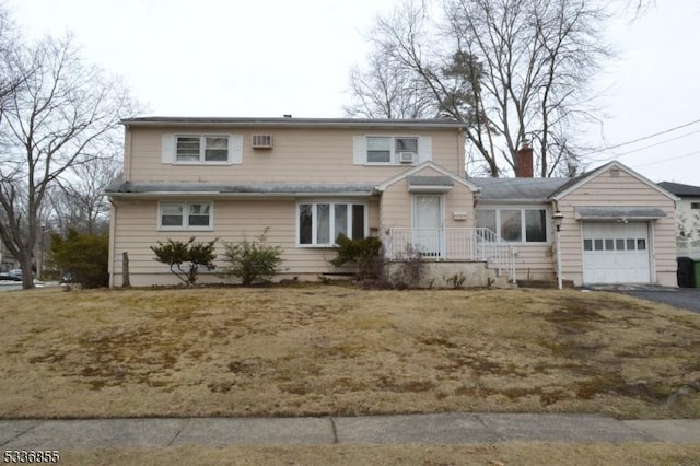 front of property with a garage