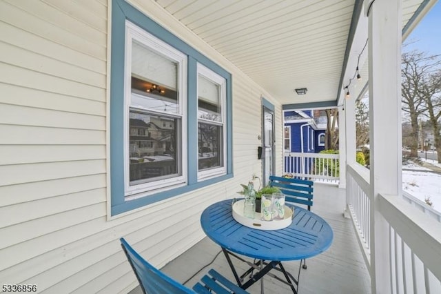 balcony featuring a porch