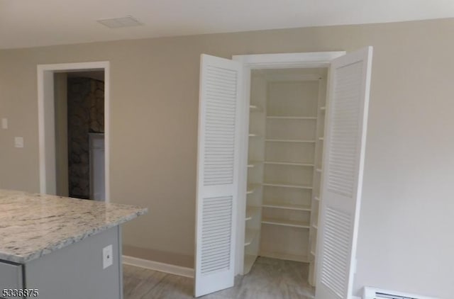 pantry with baseboard heating