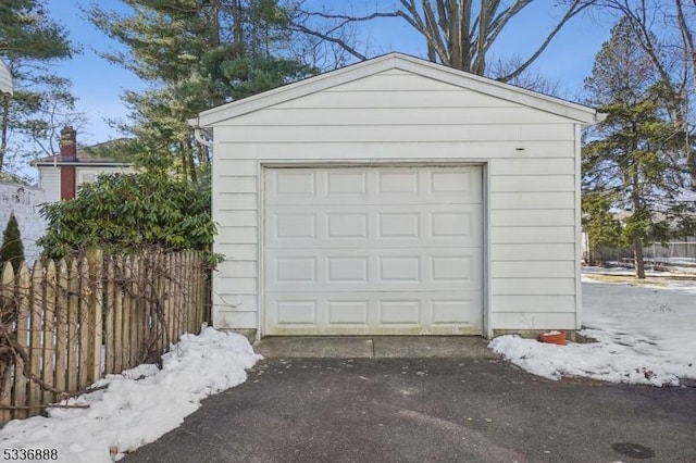 view of snow covered garage