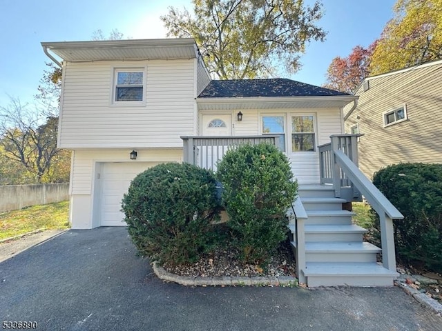 view of front of property with a garage