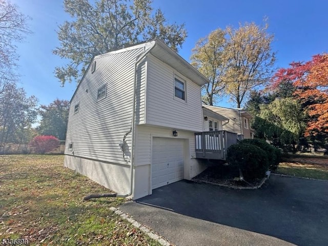 view of property exterior featuring a garage