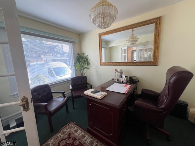 office featuring an inviting chandelier